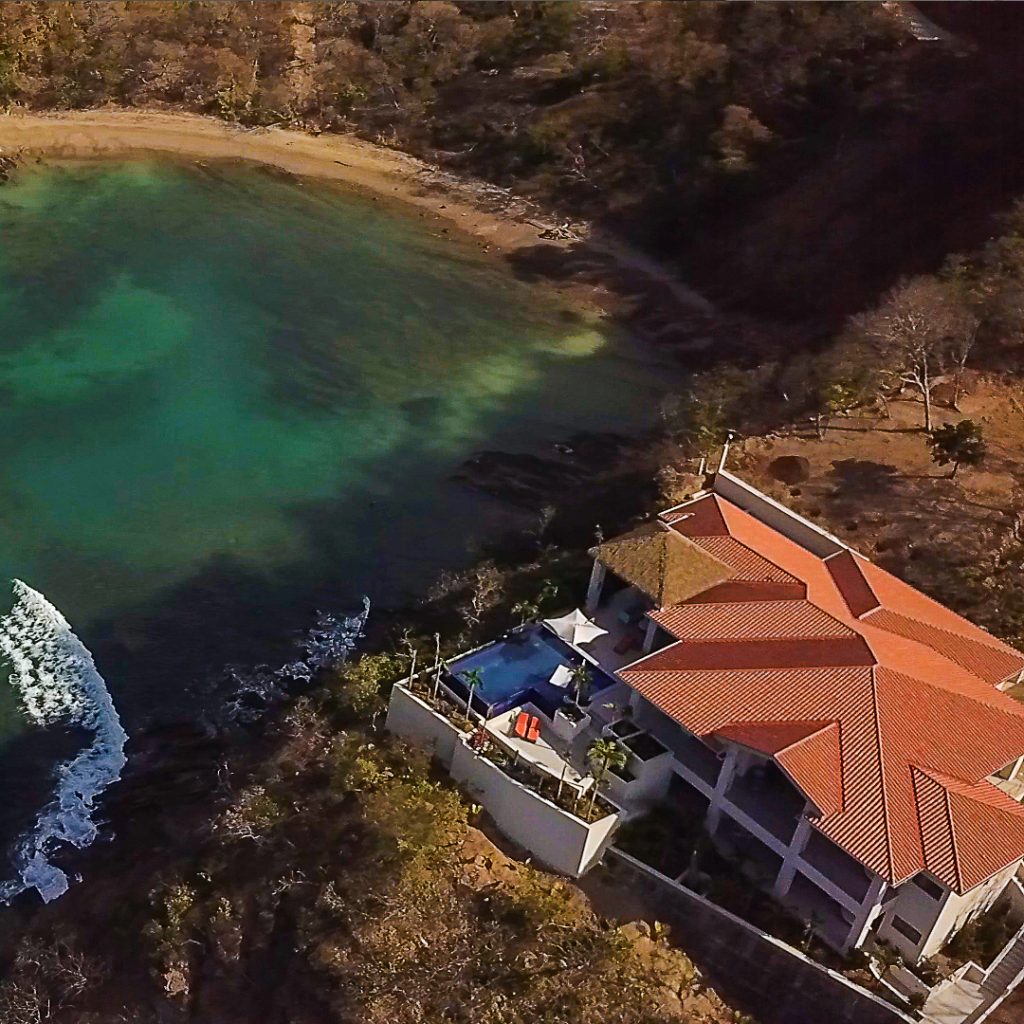Aerial shot of Villa Nova house on the southern point of Cala Bay in Cala Azul Nicaragua outside of San Juan del Sur Nicaragua