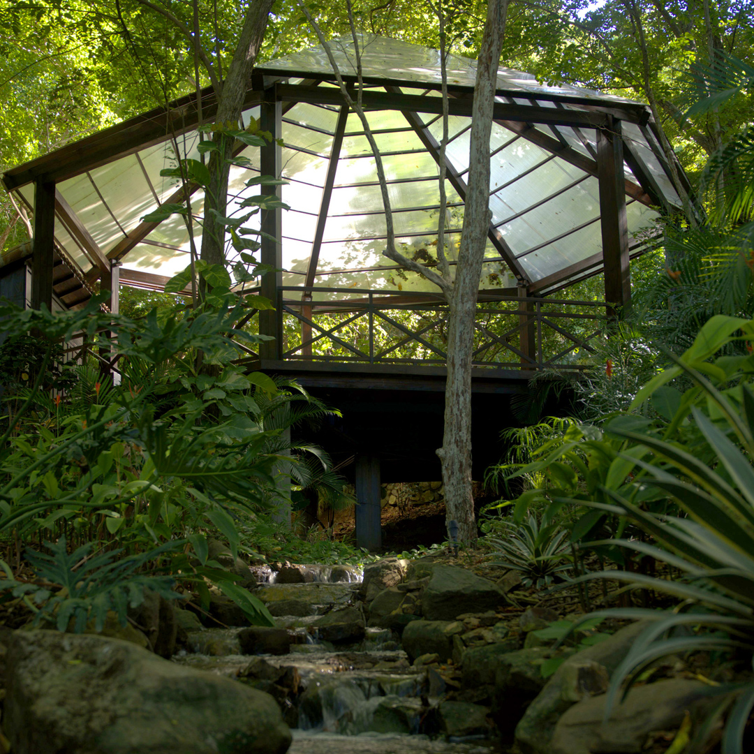 Cala Azul Yoga Pavilion view from the stream up towards the platform