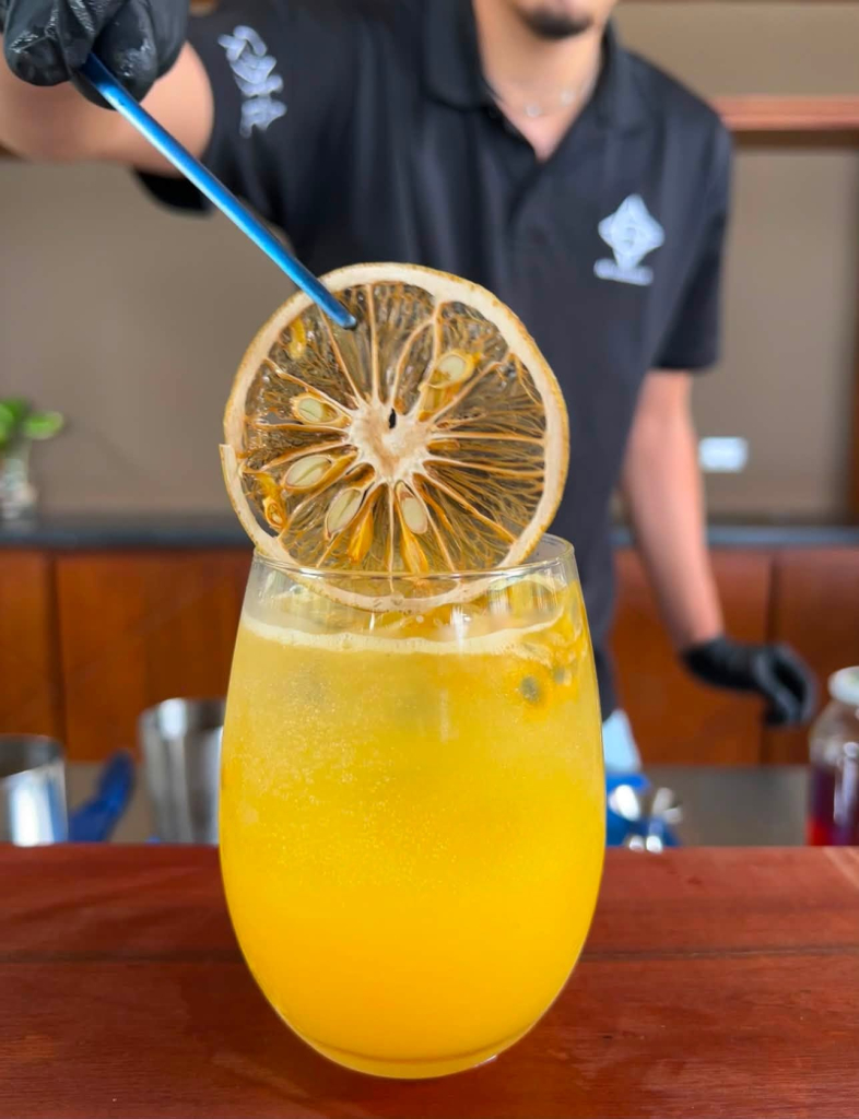 Fresh citrus cocktail being prepared at Restaurante Tierra